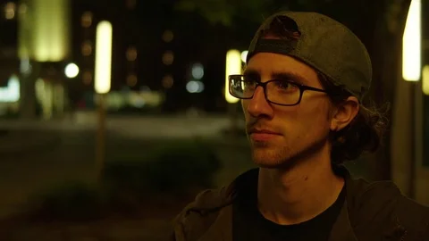 Man Roams a Dark City Stock Footage 77208688
