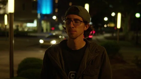 Man Roams a Dark City Stock Footage 77208830