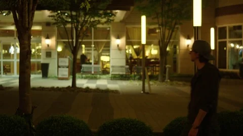 Man Roams a Dark City 動画素材 77208972