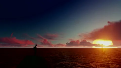 A man on a rock against the background of a sunset on the sea Stock Footage 235561180