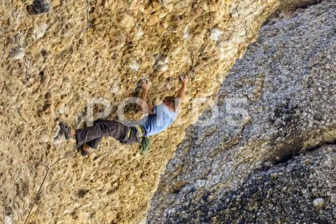 Man rock climbing difficult overhang Maple Canyon bold 2705.jpg