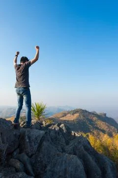 Man on rock at mountain Foto stock