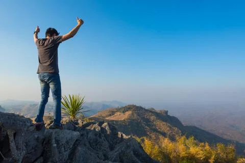 Man on rock at mountain Stock Photos