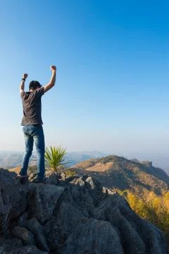 Man on rock at mountain Stock Photos