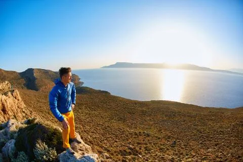 Man on the rock Stock Photos