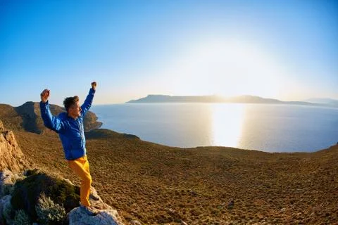 Man on the rock Stock Photos