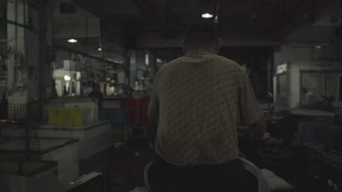 A man rode a tricycle through the fish market. Stock Footage 172053609