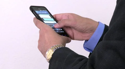 Man with Rolex Texting on a SmartPhone, Close-up Stock Footage 40844040