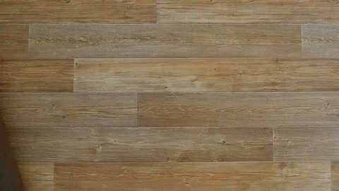 Man roll out rolls of colored leather to the table Stock-Footage 81420233