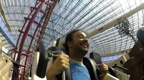 Man on roller coaster V5 - HD Stock Footage 12248615