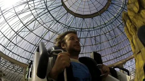 Man on roller coaster V6 - HD Stock Footage 12248540