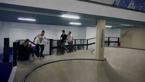 Man on roller skates performs stunts Stock Footage 102133342