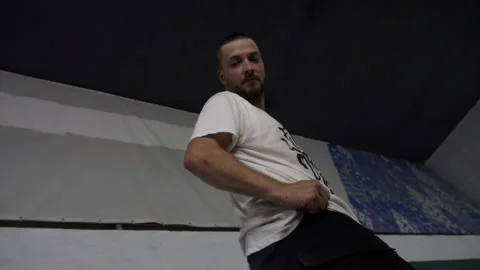 Man on roller skates is preparing to perform tricks Stock-Footage 102150099