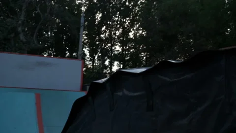 Man on roller skates rolls off a springboard 库存影片 102260802