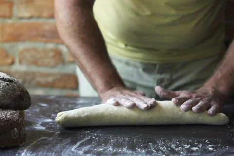 Man rolling the dough, slow motion at 240 fps Stock-Footage 31701924