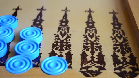 Man rolls dice once in backgammon Stock Footage 129942141