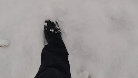 A man from Romania walks through the snow Stock Footage 232227729
