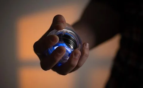 Man Rotating A Gyroball Trainer Stock Photos