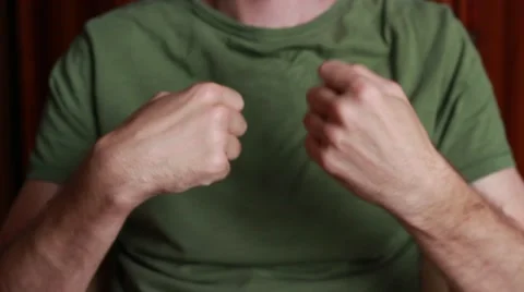 Man rotating his hands while gymnastic exercises Vídeo Stock 65372115