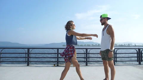 Man is rotating his hugged girlfriend around Stock Footage 68669769