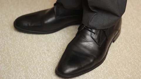 Man rotating in office shoes 動画素材 73505930