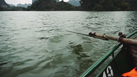 Man Rowing Boat On Ninh Binh, Vietnam Stock Footage 132165820