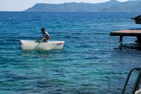 Man Rowing the Boat Stock Photos