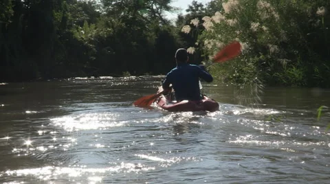 Man rowing a canoe. Stock Footage 60980662