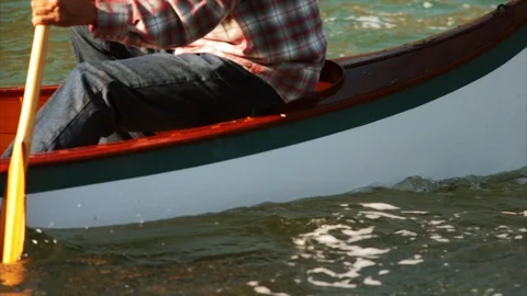 Man rowing his canoe on river. Stock-Footage 88405759