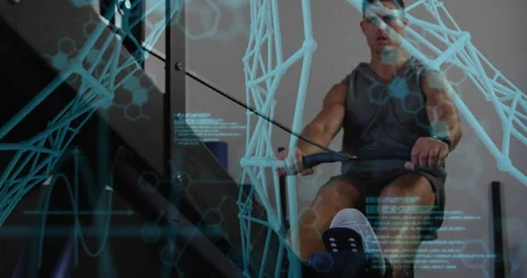 Man rowing on machine and syncing blue graphics tracking muscle effort for Stock Footage 312905026