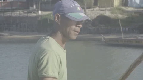 Man rowing with a stick (slow motion) Stock Footage 168819060