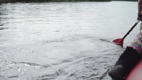 Man rows paddle in boat Stock Footage 120495762