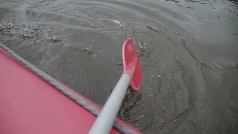 Man rows paddle in boat 動画素材 120495830