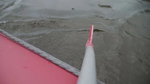 Man rows paddle in boat Stock Footage 120495846