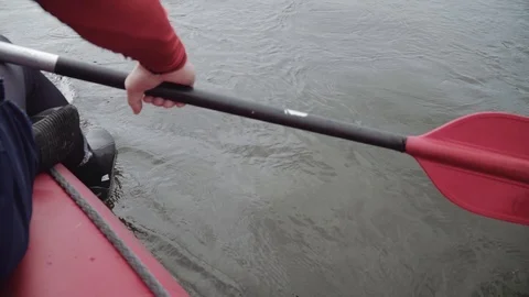 Man rows paddle in boat Video stock 120496044