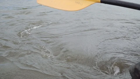 Man rows paddle in boat 스톡 동영상 120496201