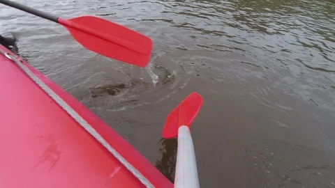 Man rows paddle in boat Stock Footage 120496923