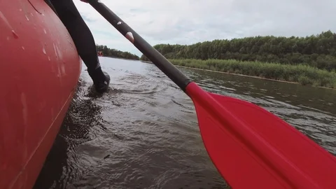 Man rows paddle in boat Video stock 120497656
