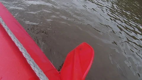Man rows paddle in boat Stock Footage 120498676