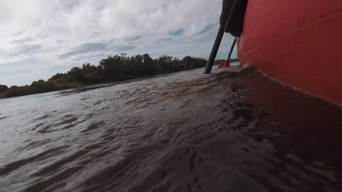 Man rows paddle in boat Video stock 120499979