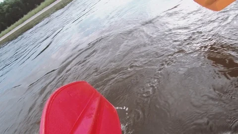 Man rows paddle in boat Video stock 120502788