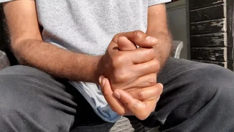 Man Rubbing both hands together Stock Footage 301448207