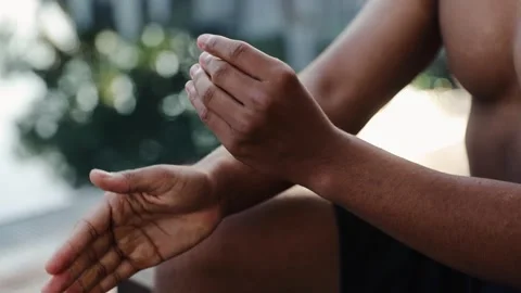 Man rubbing hands dispensing sunblock, preparing skin for sun protection Stock Footage 333564871