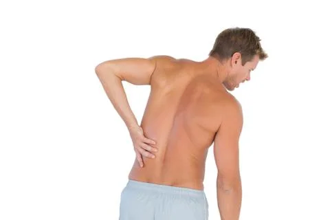 Man rubbing his back because of a back pain Photos