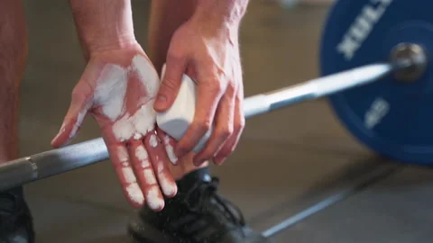 Man Rubs Chalk on Hands At The Gym &amp; Claps Stock Footage 167285253