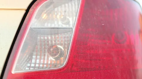 Man rubs headlight machine cloth. Hand close-up Stock Footage 63138487