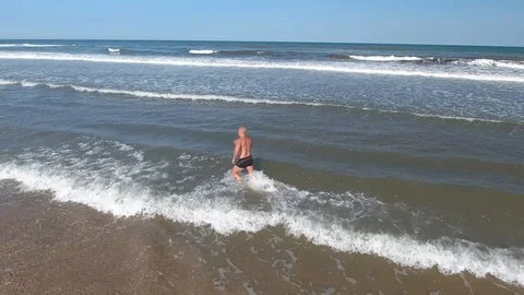 Man run on the beach along the sand. Stock Footage 102581296