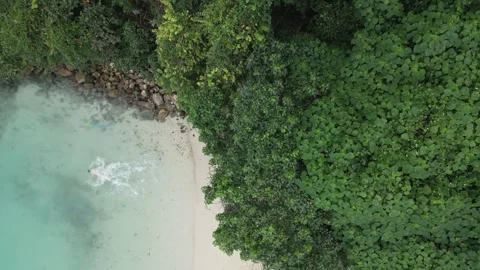 A man run into the beach of Koh Phi Phi Thailand Stock Footage 241916855