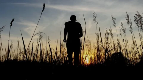Man run on meadow Stock Footage 92938917