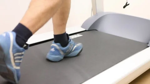 Man runner on a running belt Stock Footage 1123024